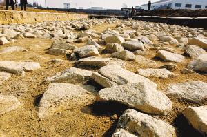  良渚古城：“一堆石头”引发争议
