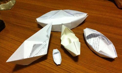 关于折纸飞机的作文 折纸船的作文