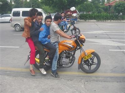 摩托车超载小孩 摩托车超载一人怎么处罚