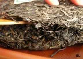 如何打开普洱茶饼 打开普洱茶饼的技巧（组图）