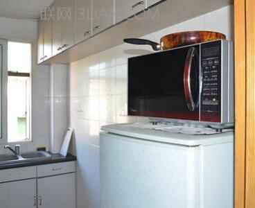 微波炉放在什么位置好 微波炉可以放在冰箱上面吗